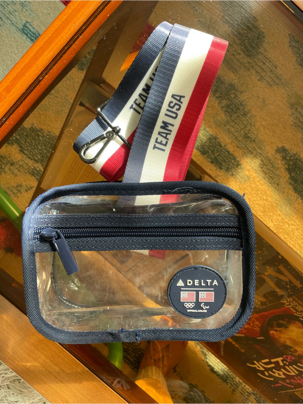 Delta Clear Travel Pouch with Navy Trim and Red-White-Blue Lanyard